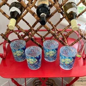 4 Lilly Pulitzer rocks glasses with 4 flamingo stirrers.